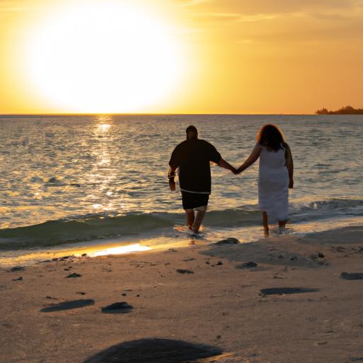 Đôi tình nhân đi dạo trên bãi biển, nắm tay và thưởng thức hoàng hôn vào ngày kỷ niệm 10 năm ngày cưới